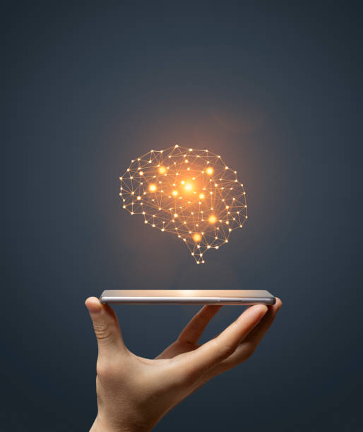 artificial intelligence brain symbol on smartphone - synapse human nervous system brain cell imagens e fotografias de stock