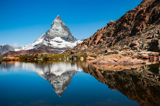 istock Riffelsee lake and Matterhorn, Switzerland 1682282642