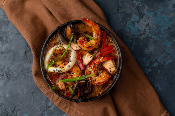 istock Tom Yum soup with tomato and seafood 1682308767