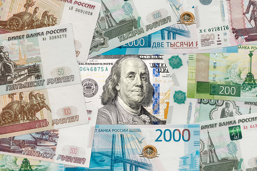 American dollar  and Russian ruble banknotes.