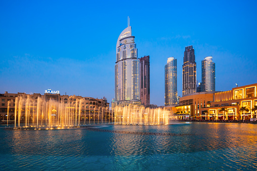 DUBAI, UAE - FEBRUARY 25, 2019: Dubai Fountains and Mall, the second largest shopping mall in the world located in Dubai in UAE