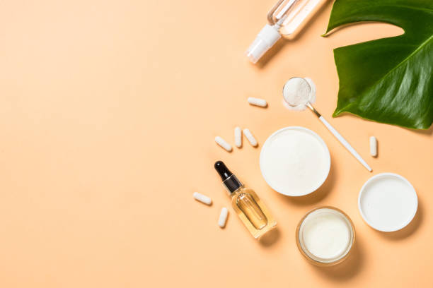 istock Collagen powder dietary supplement at blue. 1682329710