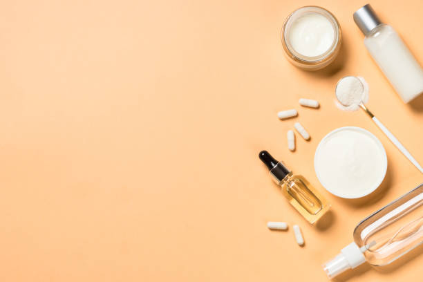 istock Collagen powder dietary supplement at blue. 1682329940
