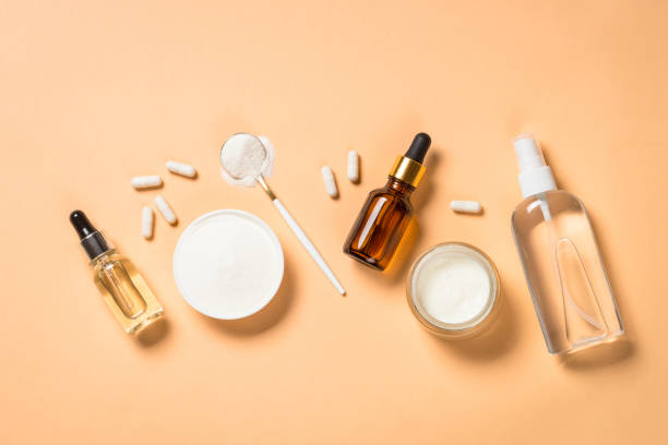 istock Collagen powder dietary supplement at blue. 1682330218