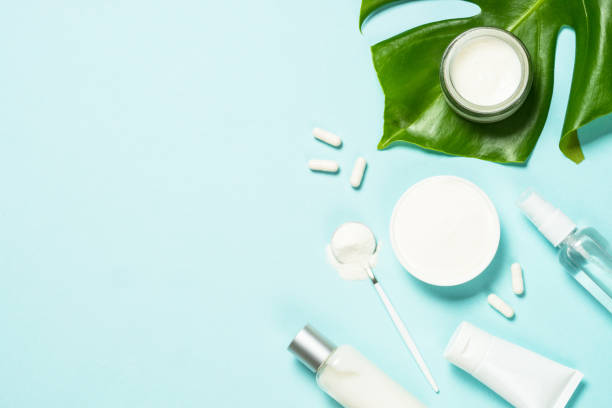 istock Collagen powder dietary supplement at blue. 1682330757