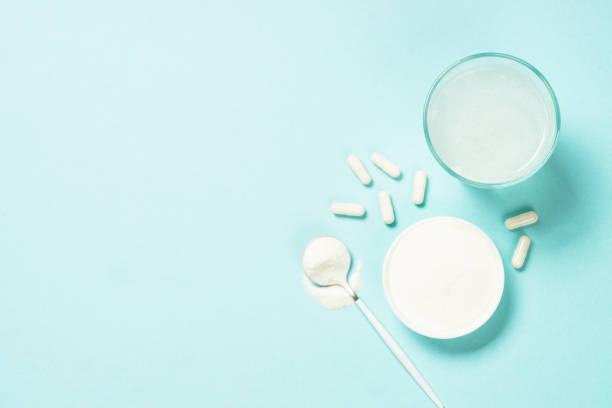 istock Collagen powder drink, dietary supplement at blue. 1682330784