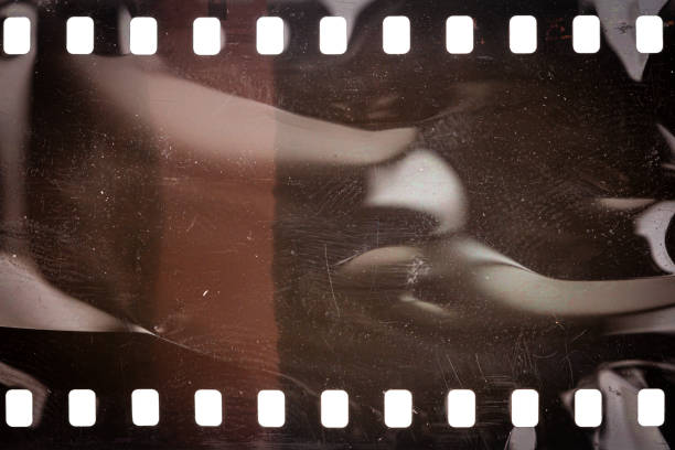 istock Dusty and grungy 35mm film texture or surface 1682347161