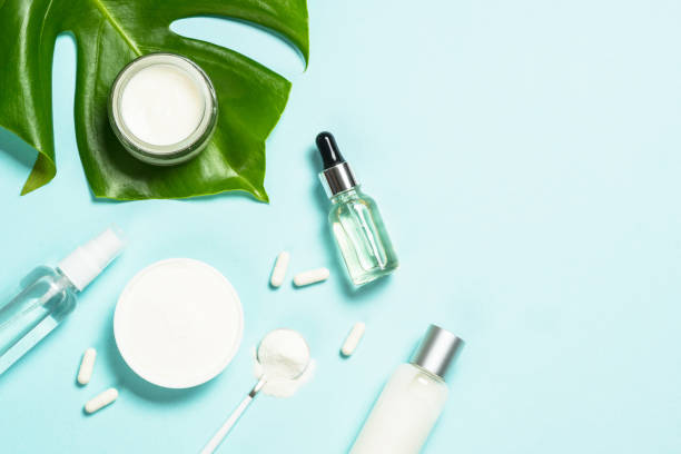 istock Collagen products and cosmetic at blue top view. 1682358534