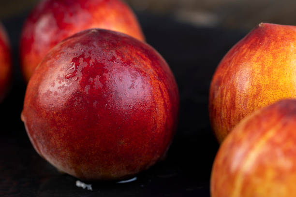 ripe delicious and fresh peaches of a red hue