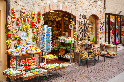 SIRMIONE, ITALY - APRIL 12, 2019: Souvenir shop in the Sirmione town which located at the Garda lake in Italy