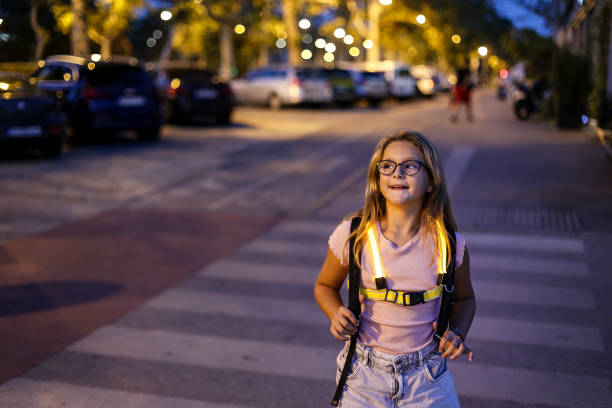 Girl in a city at night