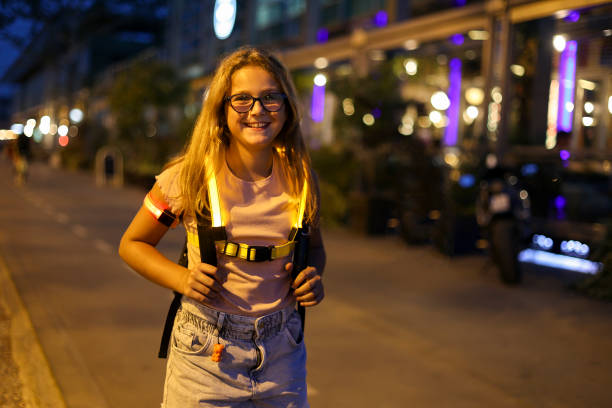 istock Girl walking at night 1682437847