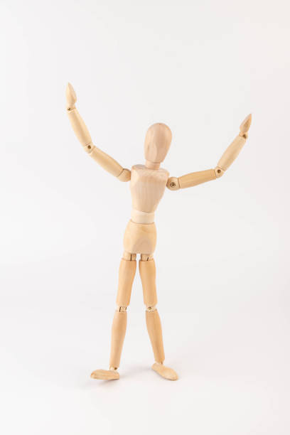 istock Wooden Mannequin, hopping, playing, without base, plain background, gesture, pose 1682439539