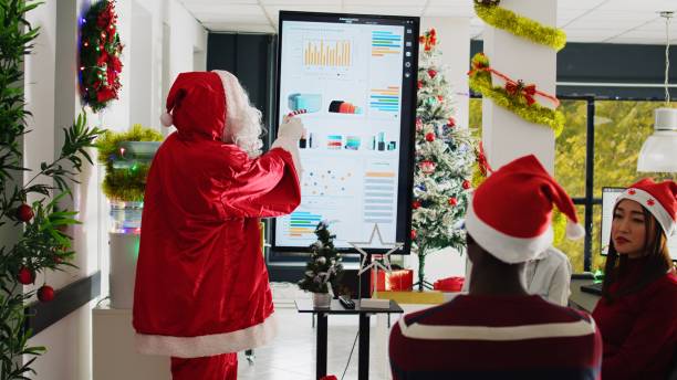 istock Public speaker dressed as Santa Claus 1682444495