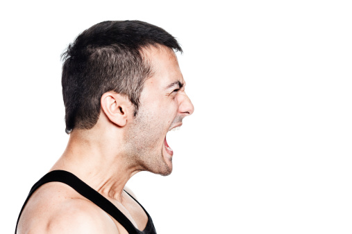 Profile of a man shouting with all his might. Isolated on white.