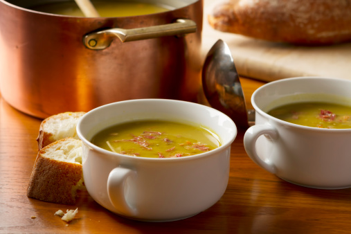 Slow simmered, home made split pea soup made with smoked pork ham hocks and served with crusty french bread.