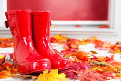 Red rubber boots at front door