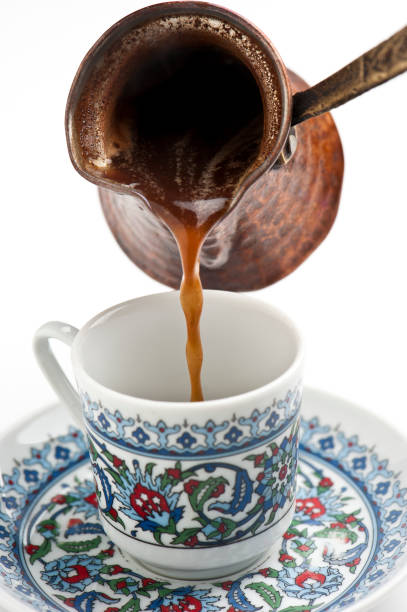 serving turkish coffee - koperen pan stockfoto's en -beelden