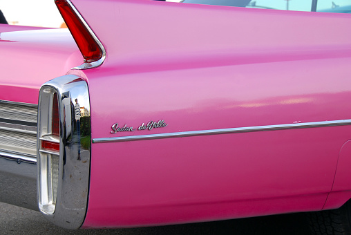 Stuttgart, Germany, 11-01-2011
close-up on tail fin of pink vintage American car