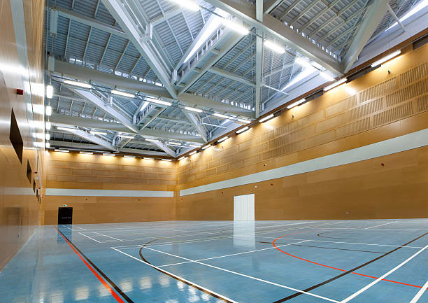 Interior of school gym with blue flooring stock photo