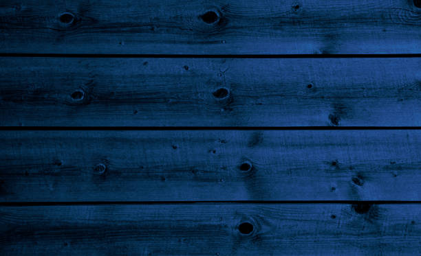 istock Blue wooden background with Christmas decoration 1682487887
