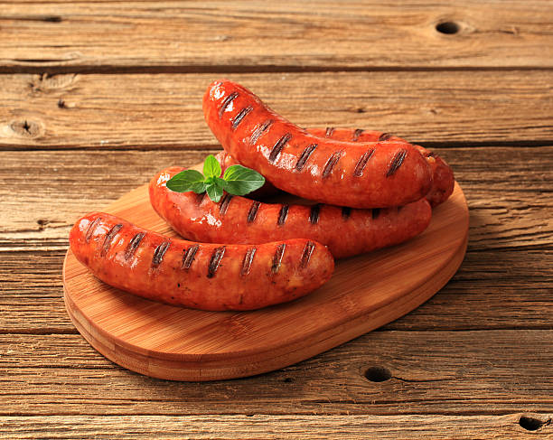 istock Grilled sausages and roasted potatoes 168249477