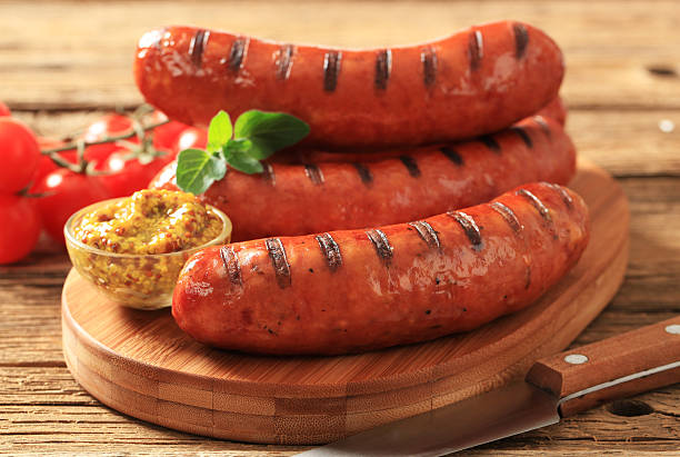 Grilled sausages Grilled sausages and spicy relish bratwurst stock pictures, royalty-free photos & images