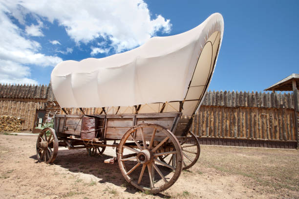 Plain WA USA Sept 14 2023: Sign for Mountain Springs Log with Antique Wagon
