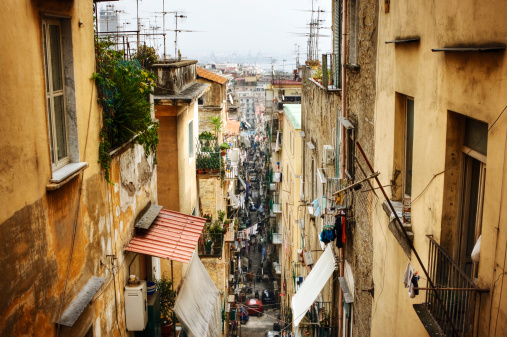 Back alley among the crowded neighborhoods of Naples Italy.  