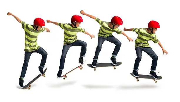 This is a series of four photos combined together to create a moving sequence of a 14 year old boy performing an ollie on a skateboard taken in the studio on a white background.