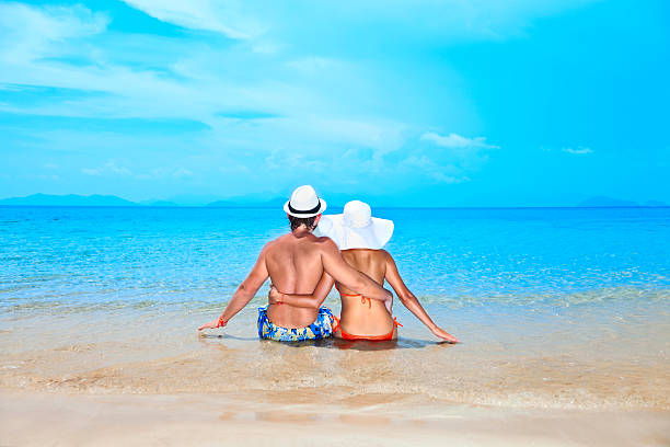istock beauty couple on sea background 168252726