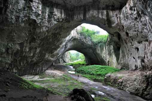 Cave Devetashka (Devetaki Cave) is situated near Lovech, Bulgaria. Its full length is 2442m, height - 60m. It is a famous place and a home for thousands of 11 different kind of bats. The cave is one of the three most significant underground habitats of bats in Europe.