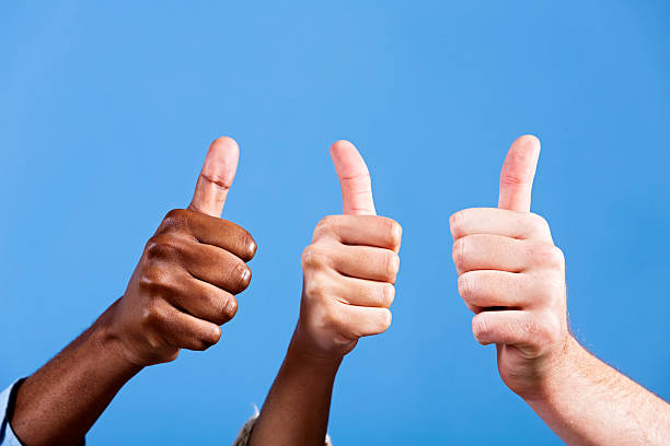 istock Three thumbs up of approval, with copy space 168253141