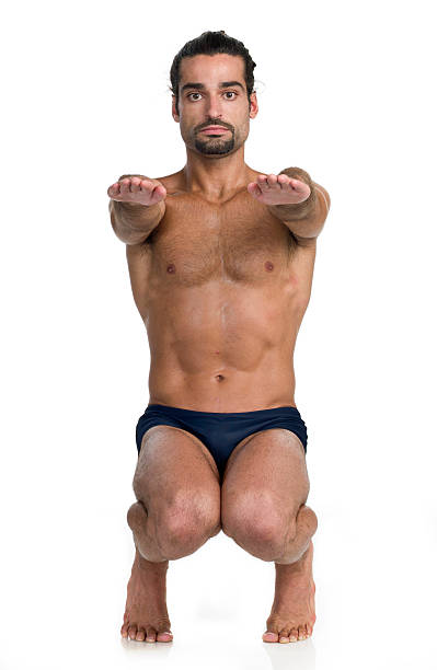 bizarre hot yoga pose (utkatasana - crouching male men sensuality photos et images de collection