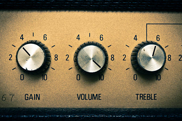 Volume knob to the max on a guitar amplifier. Retro mood.