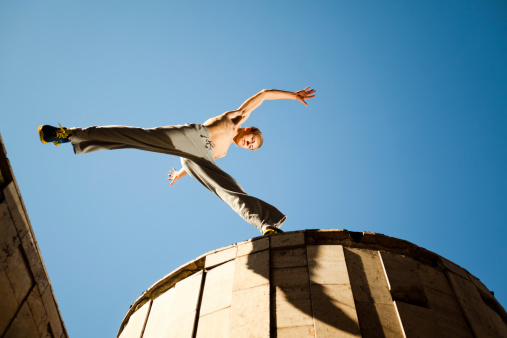 Street dancer performing jump