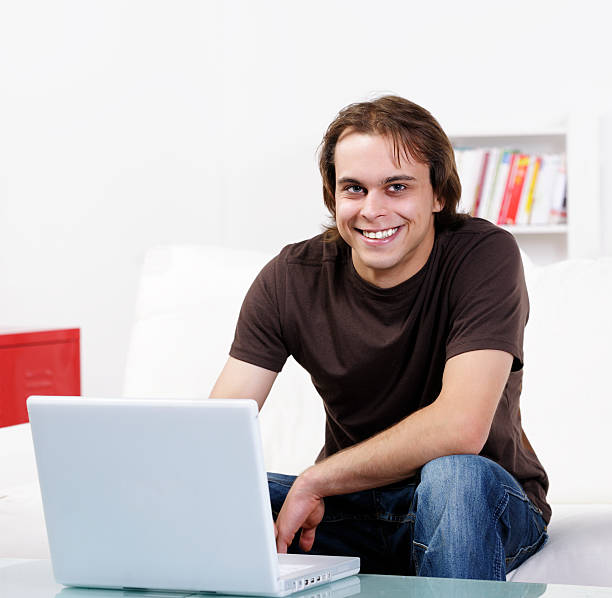 istock Young Adult Using A Laptop 168257400