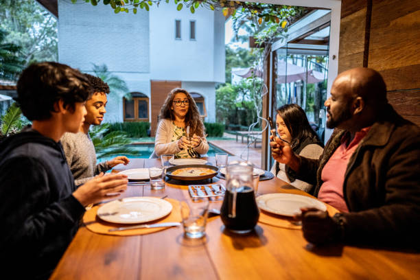 istock Family having pizza at home 1682574201