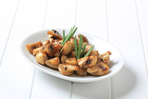 gebratene champignons - cooked roasted cooking fried stock-fotos und bilder