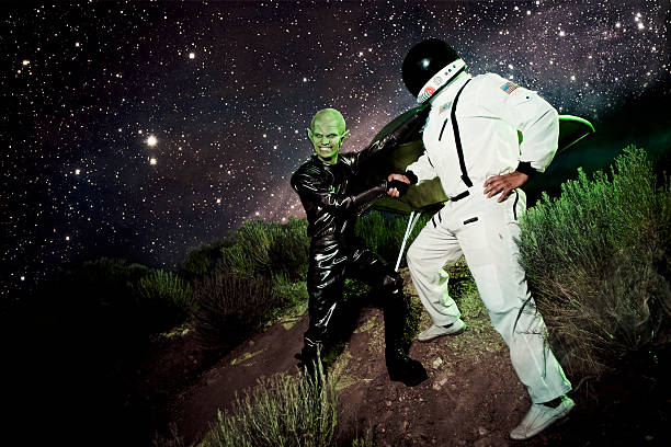 istock Alien and Astronaut UFO Spaceship Landing 168258371