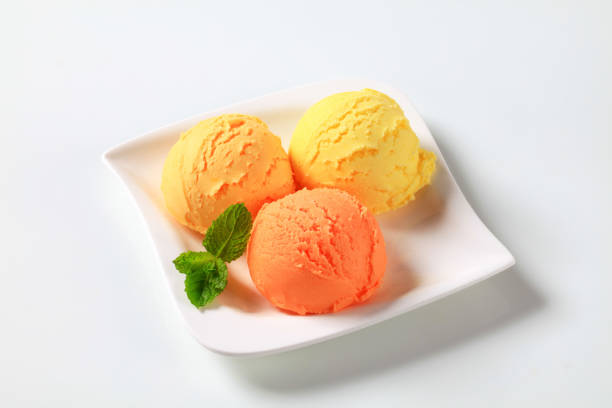 Scoops of fruit icecream on a plate