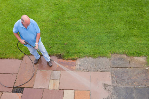istock Man Washing Patio Slabs 168258497
