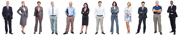 Full length of business people standing in a row on white background