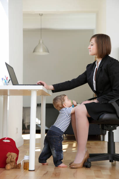 istock Working Mom at Home, trying to work 168259402