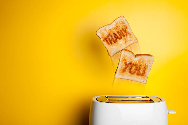 Jumping toast bread - thank you stock photo