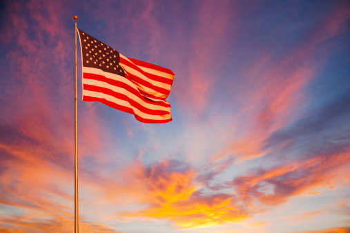 istock American Flag glows in the sunset. (P) 168259593
