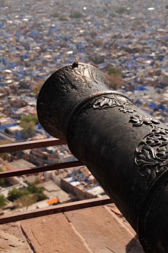 Telephoto image of cannon overlooking the Blue City of Jodhpur.