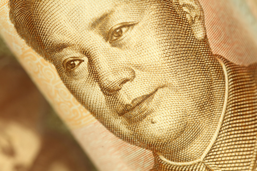 Macro of the portrait of Mao Tse-tung on Chinese yuan banknote. High resolution photo taken with Canon 5D Mark II and Sigma lens.