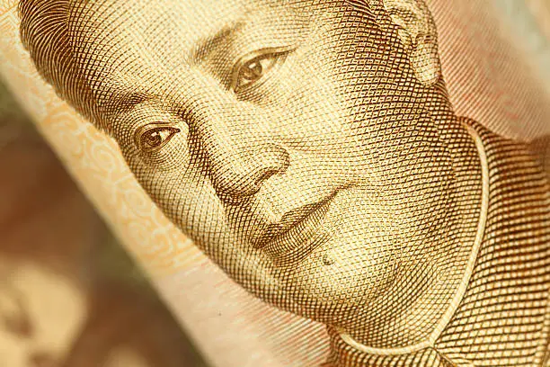 Macro of the portrait of Mao Tse-tung on Chinese yuan banknote. High resolution photo taken with Canon 5D Mark II and Sigma lens.