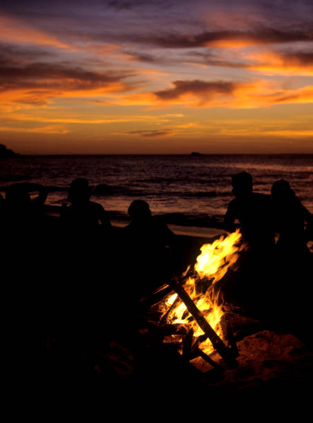 campfire on the beach stock photo